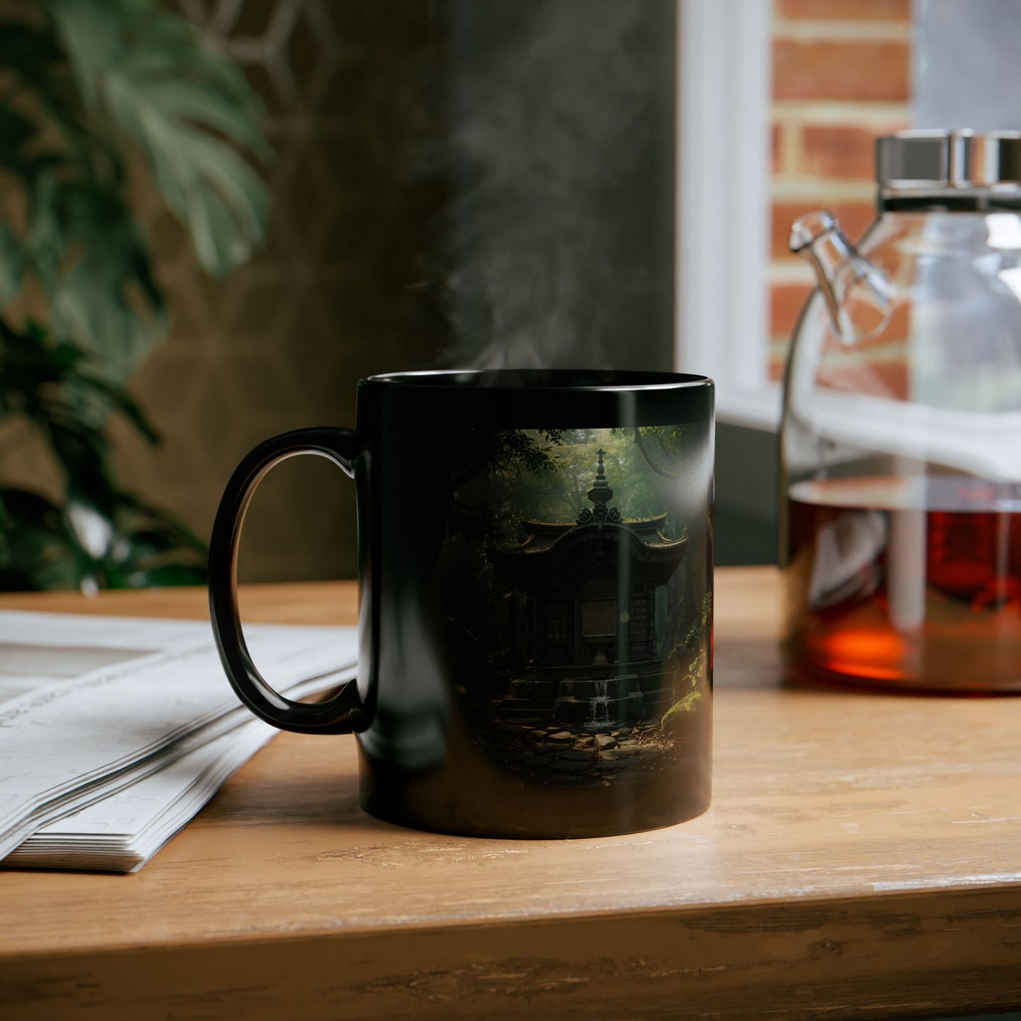 Whispering Woodland Shrine Mug - Black mug with a scenic design on a wooden table