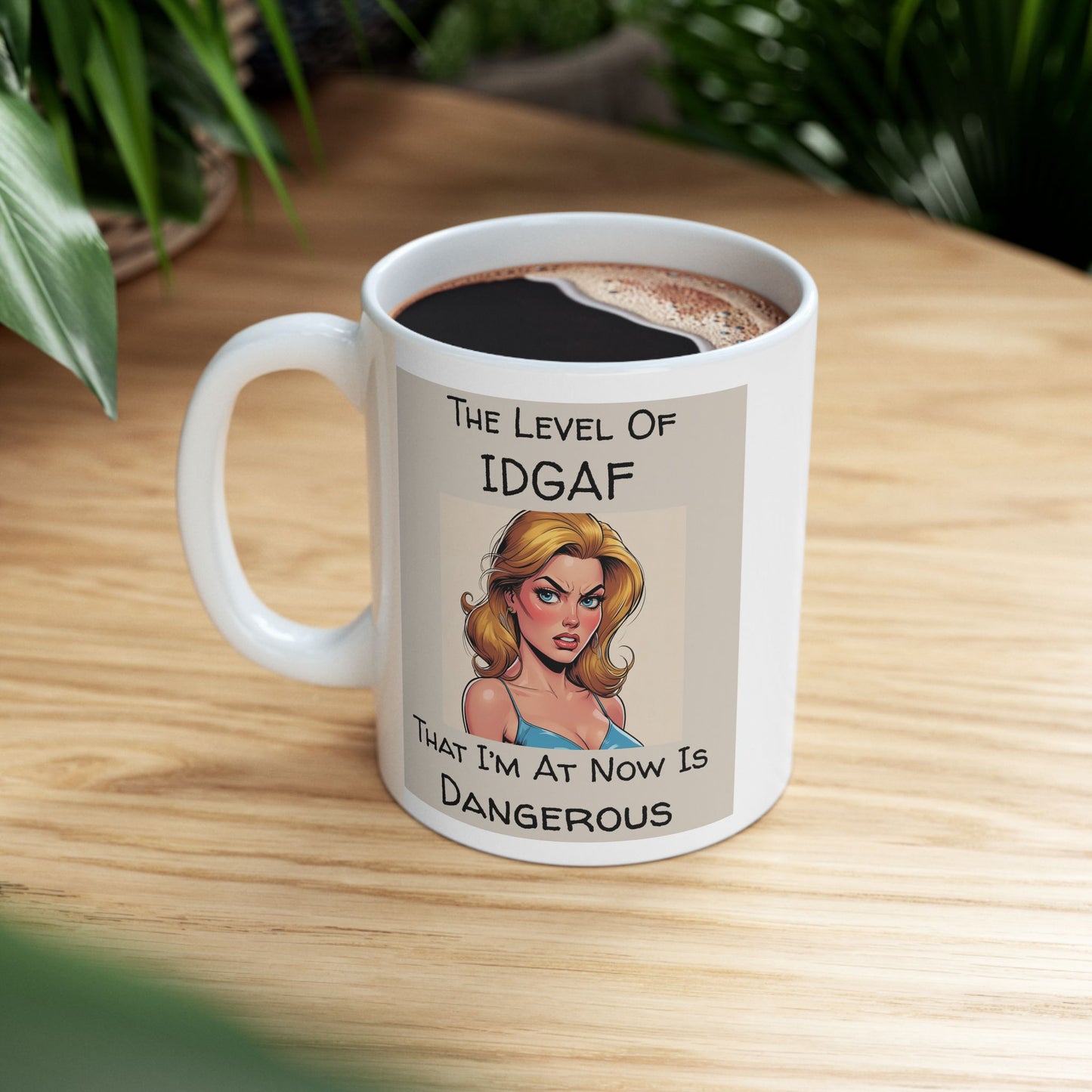 The Level of IDGAF That I’m At Now Is Dangerous Mug - white mug with cartoon image and funny text