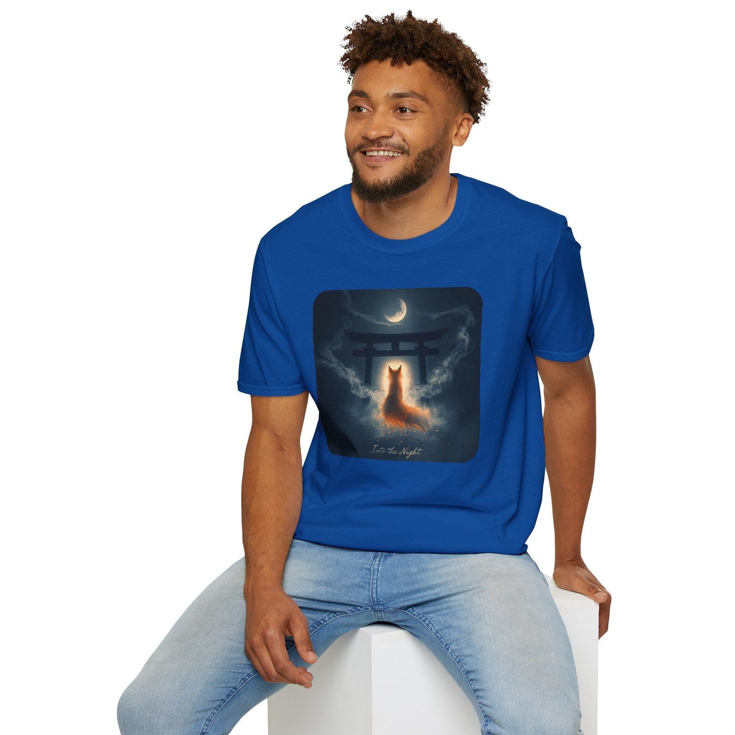 Model wearing the Into the Night Mystic Fox at the Torii T-Shirt in royal featuring a glowing fox spirit beneath a torii gate and crescent moon.