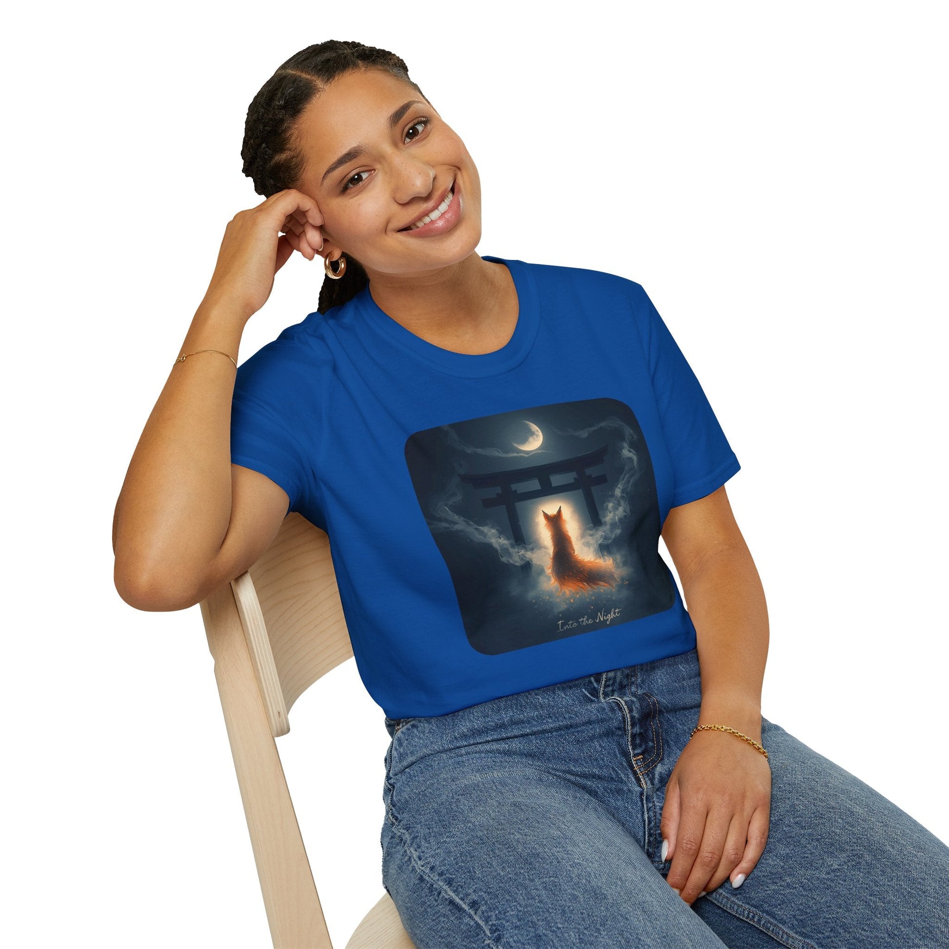 Model wearing the Into the Night Mystic Fox at the Torii T-Shirt in royal featuring a glowing fox spirit beneath a torii gate and crescent moon.