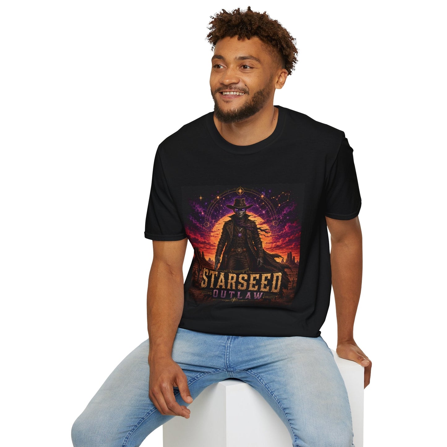 Model wearing Starseed Outlaw graphic T-shirt in black with sci-fi alien outlaw design.
