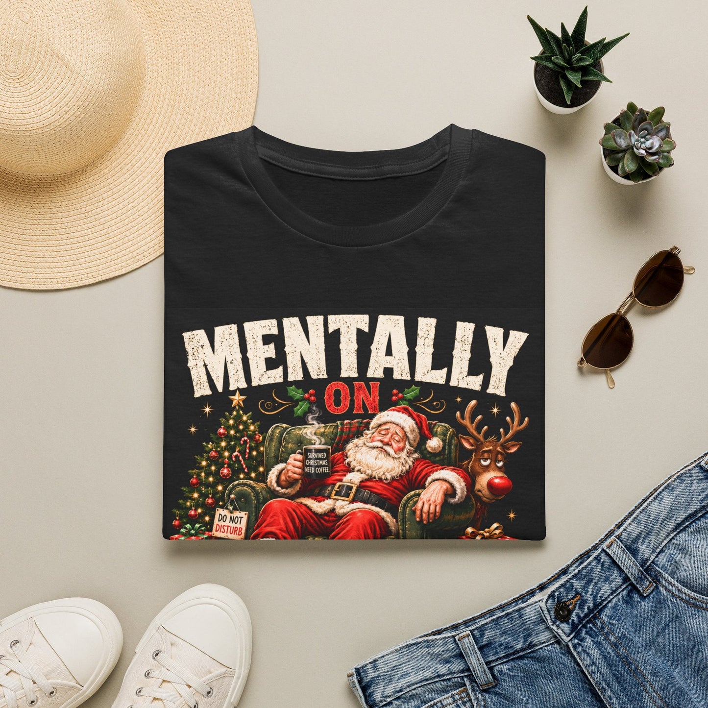 Folded Mentally on Boxing Day Santa Christmas T-Shirt in black, showing funny Christmas burnout graphic.