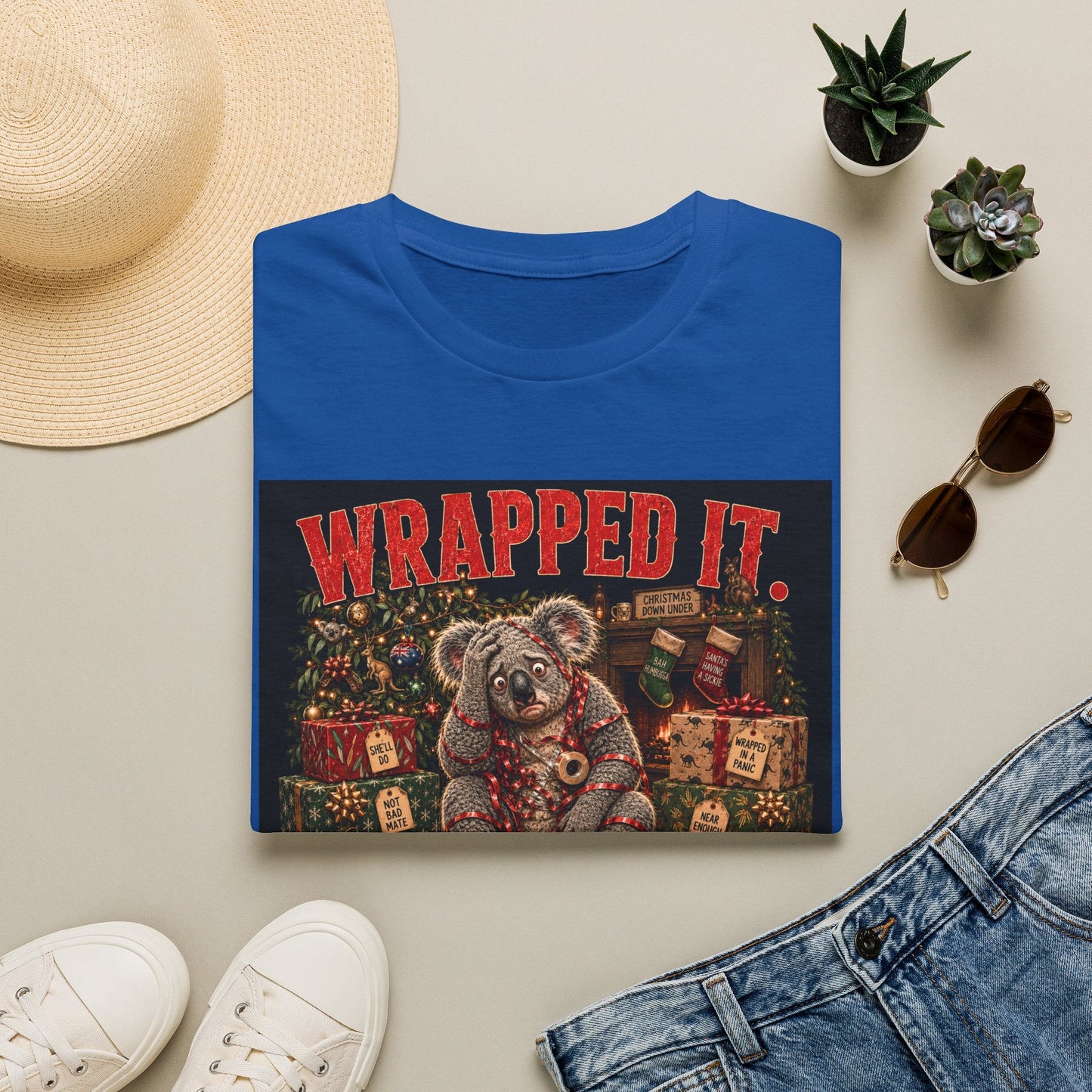 Folded Wrapped It. Regretted It. Koala Christmas T-Shirt in royal showing funny Australian Christmas artwork.