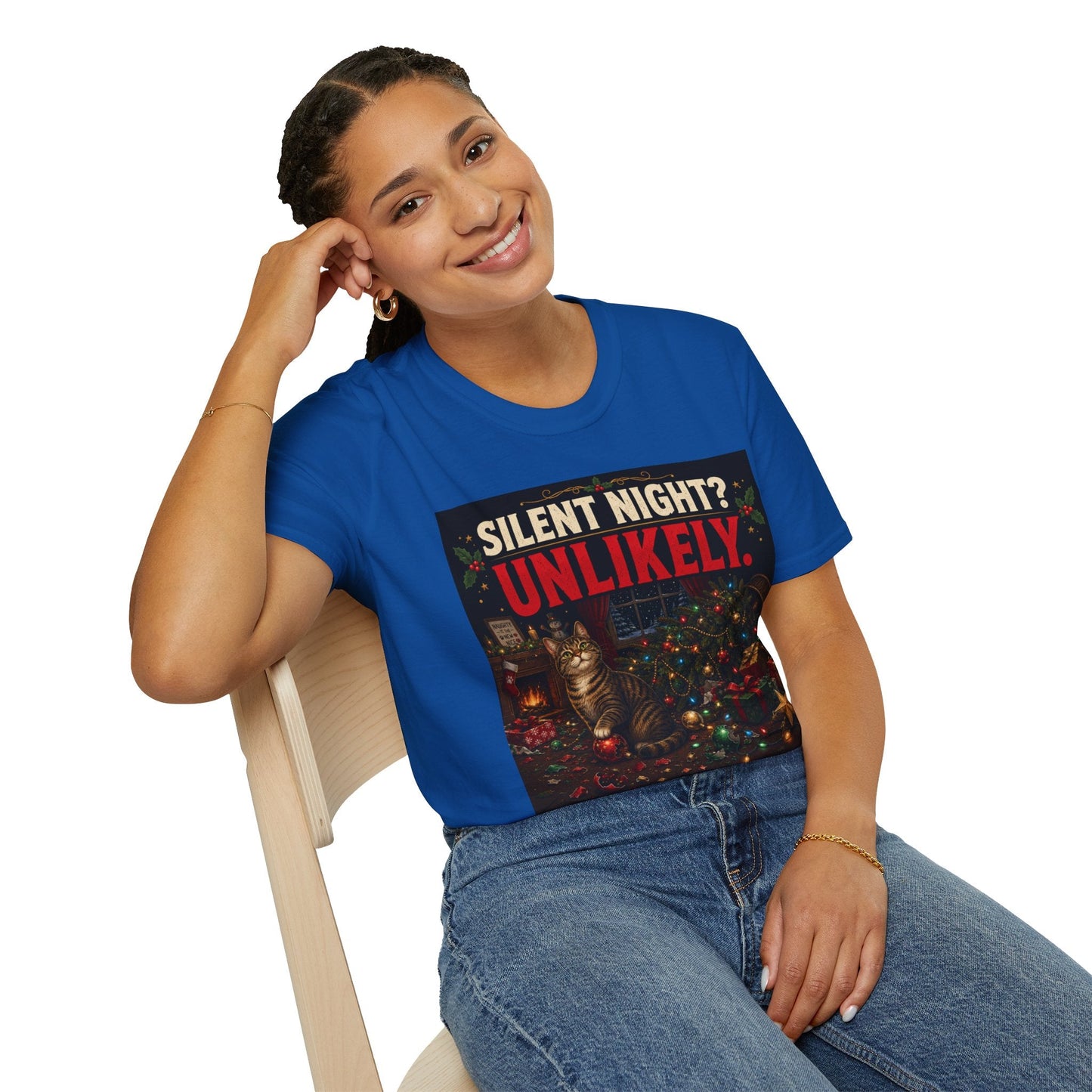 Model wearing the Silent Night? Unlikely. Cat Christmas T-Shirt in royal with funny destroyed Christmas tree artwork.