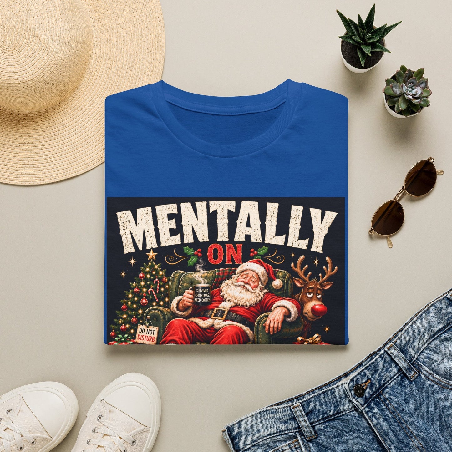 Folded Mentally on Boxing Day Santa Christmas T-Shirt in royal, showing funny Christmas burnout graphic.