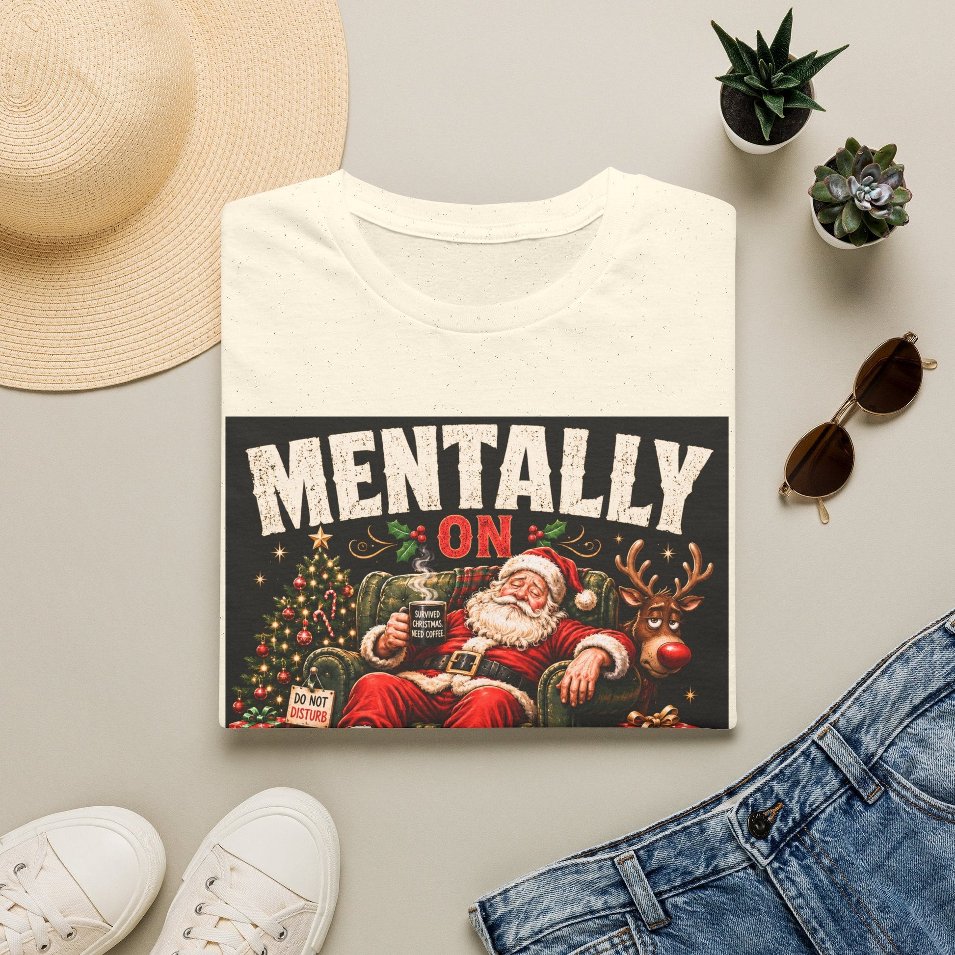 Folded Mentally on Boxing Day Santa Christmas T-Shirt in natural, showing funny Christmas burnout graphic.