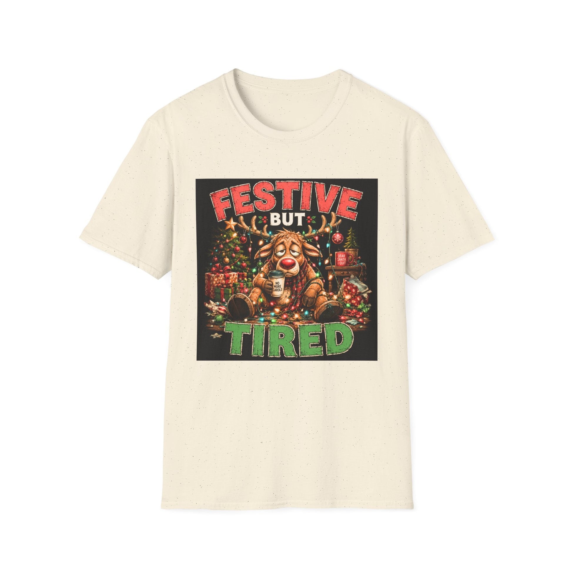 Festive But Tired Reindeer Christmas T-Shirt in natural design featuring an exhausted reindeer tangled in Christmas lights with coffee and festive chaos.