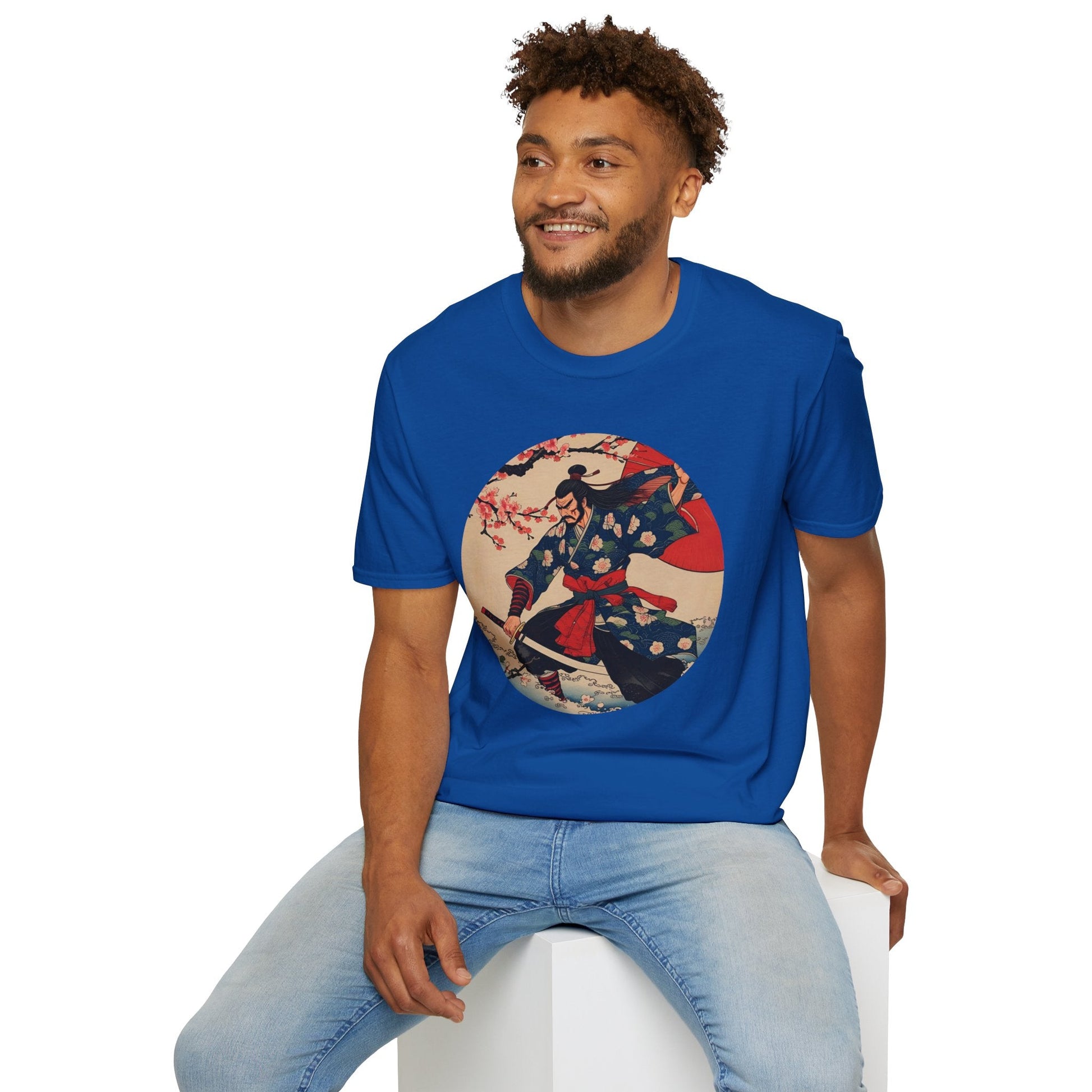 Model wearing the Crimson Bloom Ronin Samurai Warrior T-Shirt in royal featuring a Japanese-inspired samurai in motion with cherry blossoms and crimson accents.