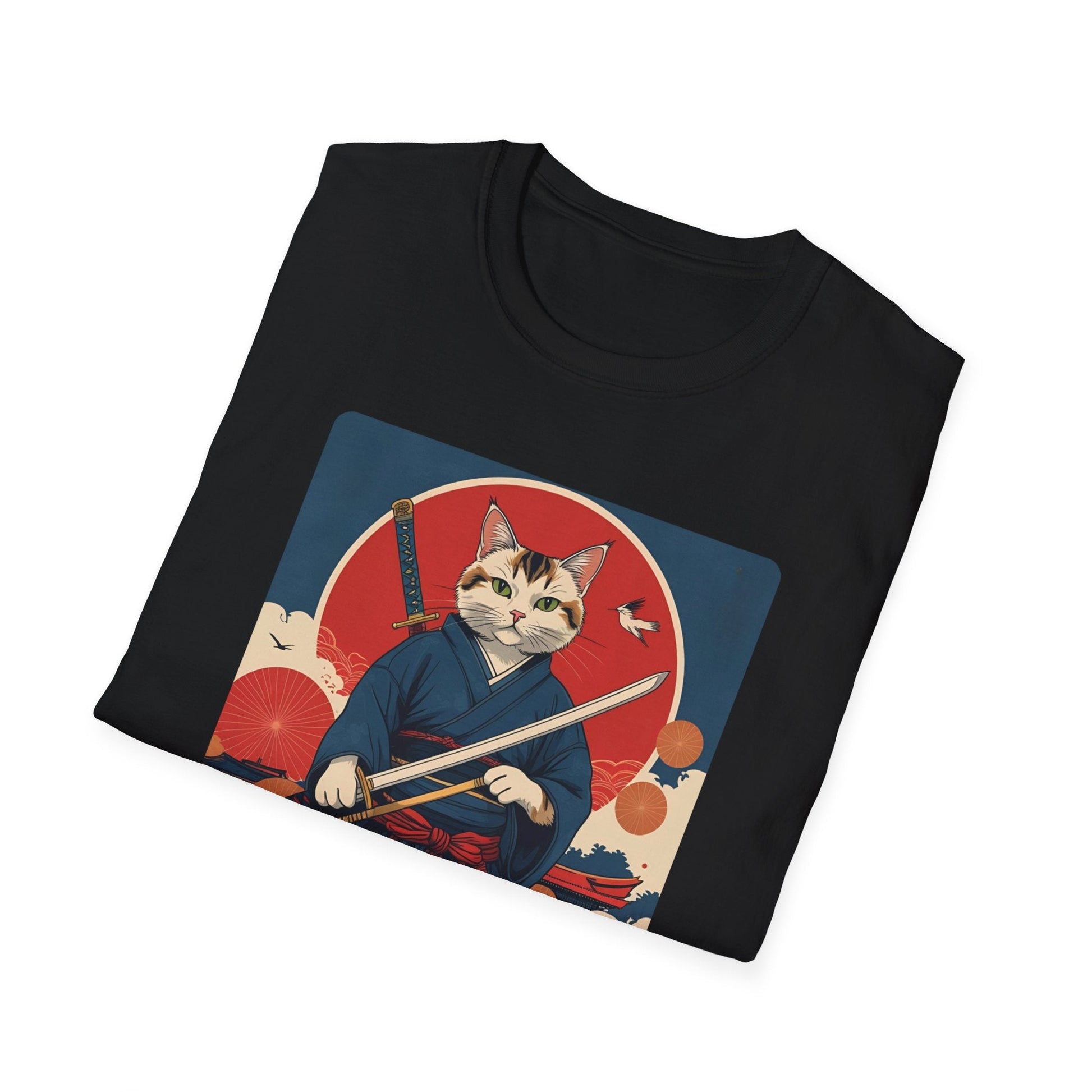 Folded Whisper of the Blade Samurai Cat T-Shirt in black showing a cat dressed as a samurai with a sword, red sun and Japanese-inspired background.