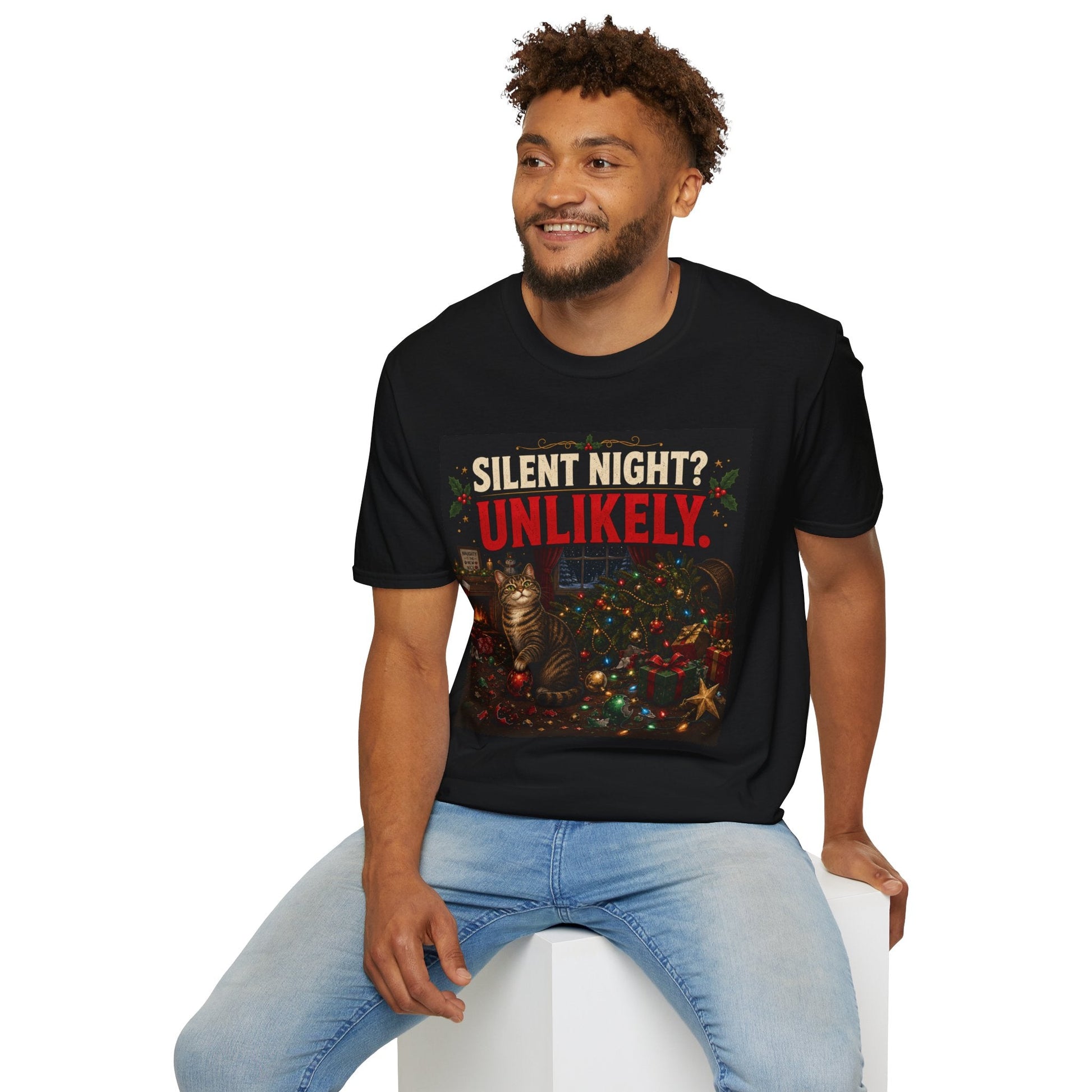 Model wearing the Silent Night? Unlikely. Cat Christmas T-Shirt in black with funny destroyed Christmas tree artwork.