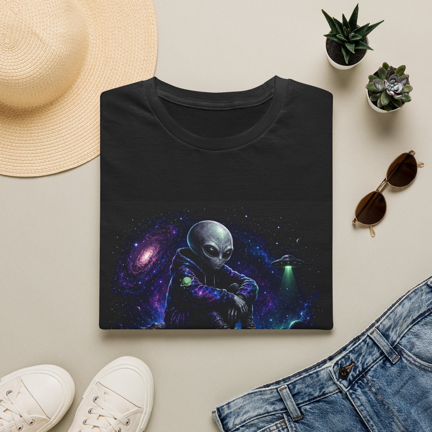 Folded Intergalactic Introvert alien T-Shirt in black with sci-fi artwork