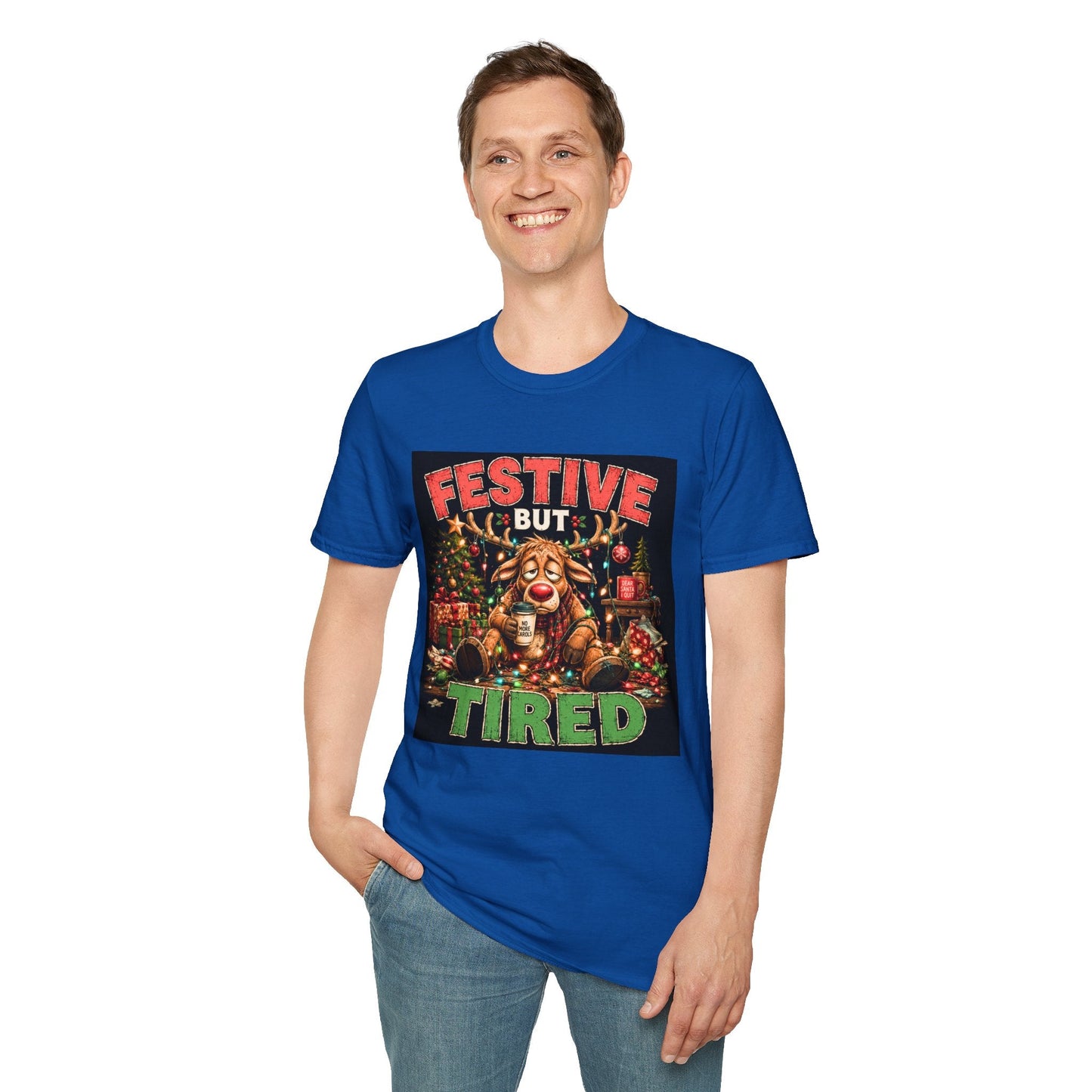Model wearing the Festive But Tired Reindeer Christmas T-Shirt in royal with funny tired reindeer artwork.