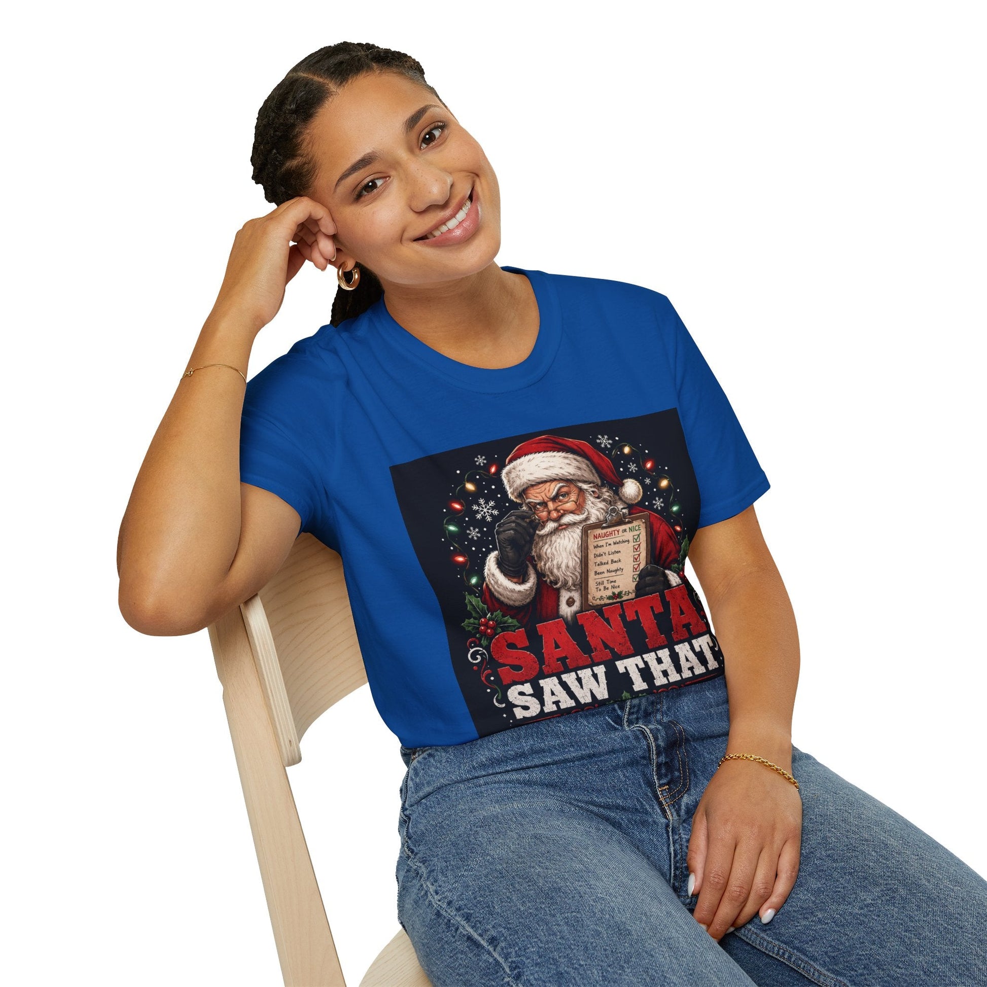 Model wearing the Santa Saw That Christmas T-Shirt in royal with funny Santa naughty list artwork.