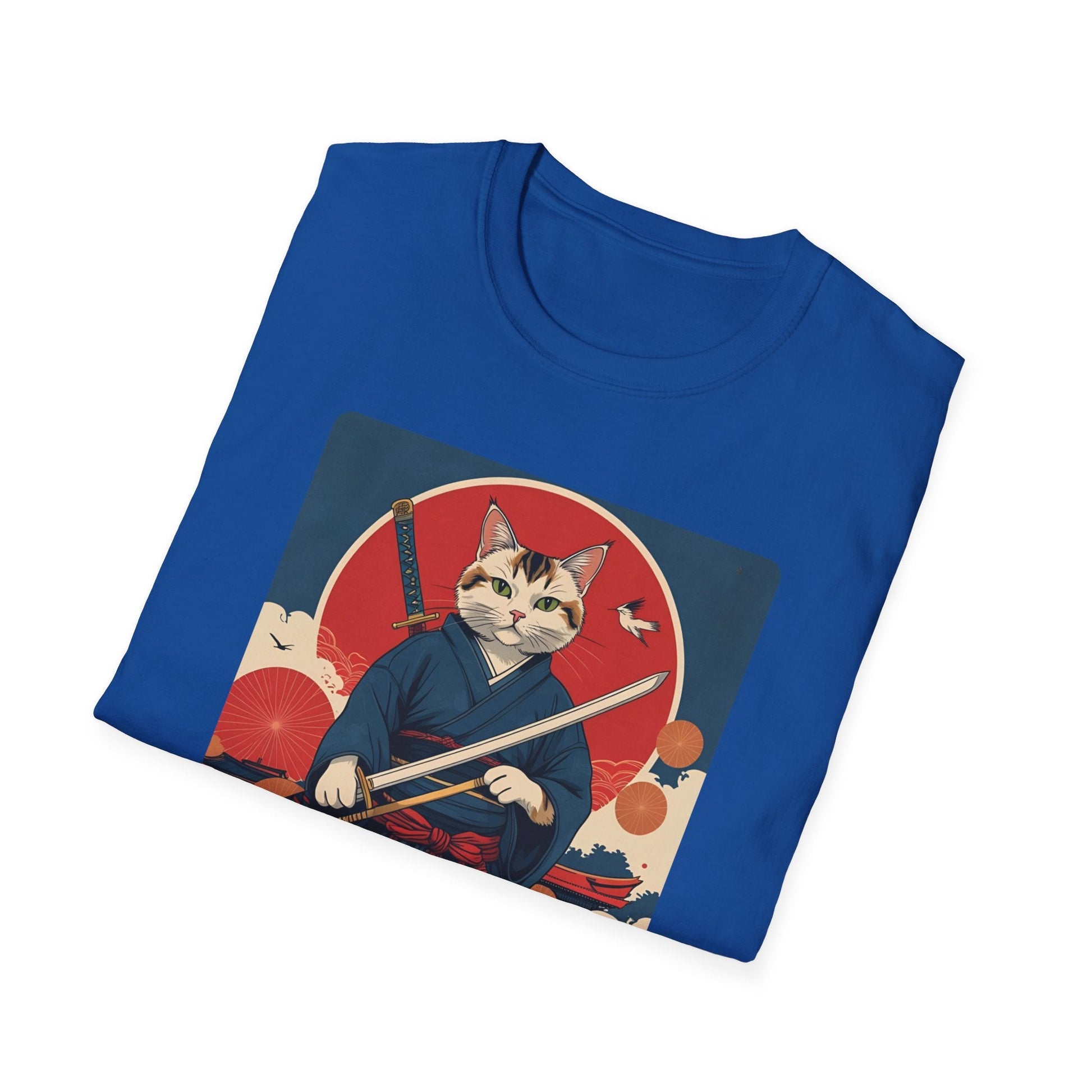 Folded Whisper of the Blade Samurai Cat T-Shirt in royal showing a cat dressed as a samurai with a sword, red sun and Japanese-inspired background.