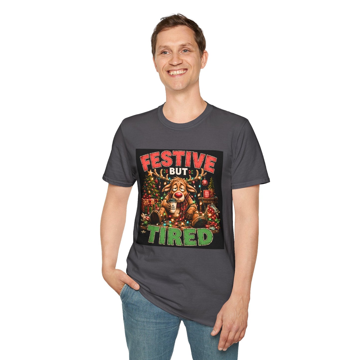 Model wearing the Festive But Tired Reindeer Christmas T-Shirt in charcoal with funny tired reindeer artwork.